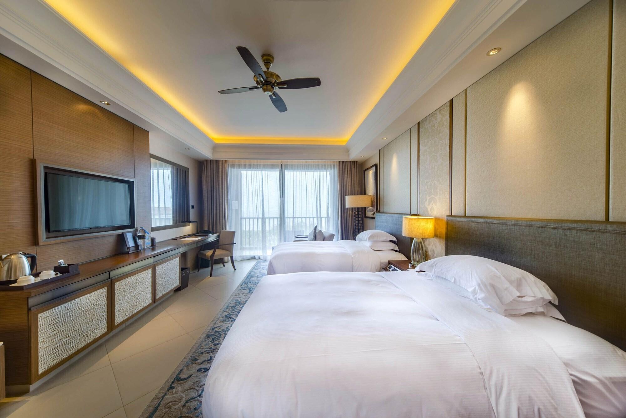 Hilton Haikou Meilan - Beachfront Hotel Exterior foto