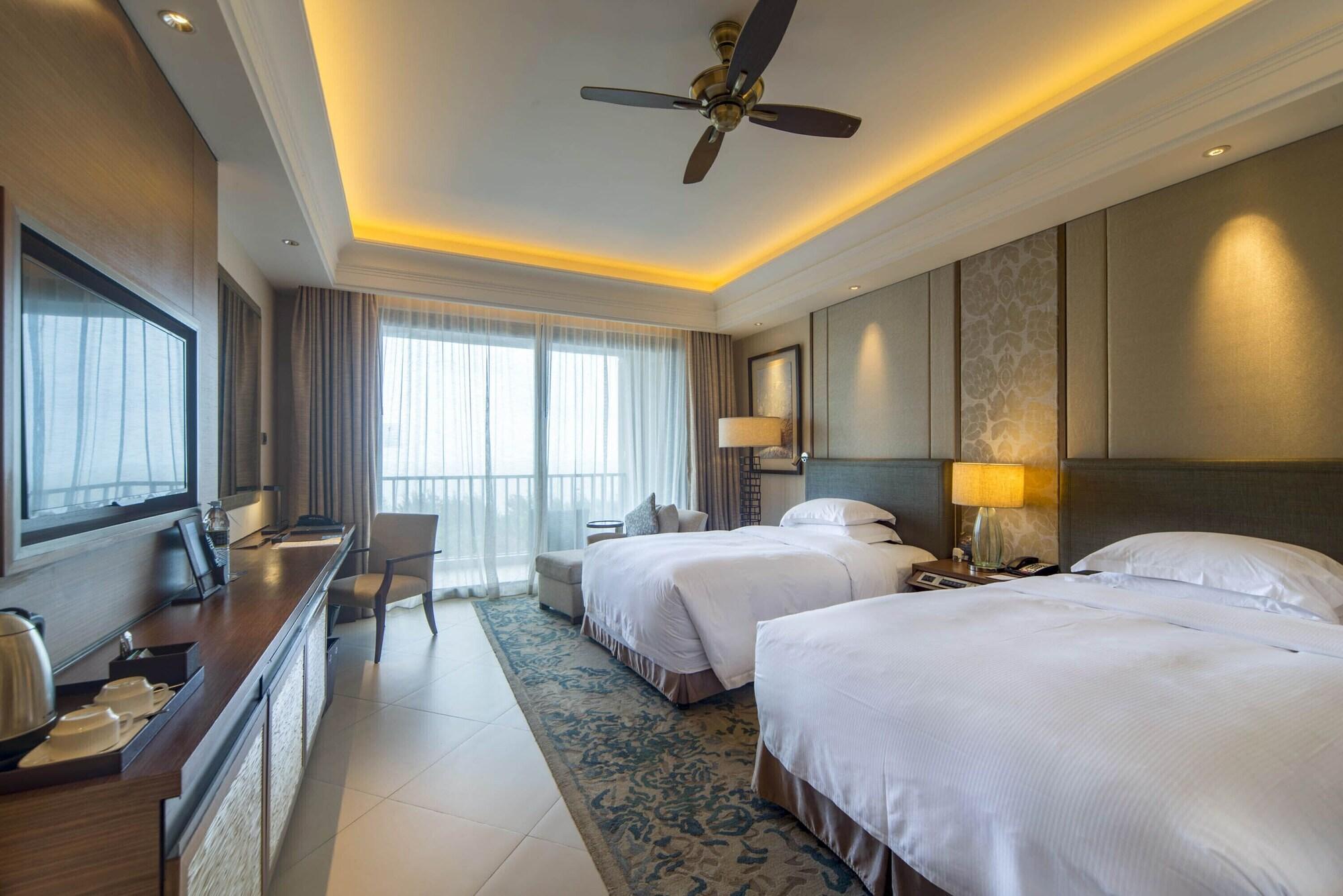 Hilton Haikou Meilan - Beachfront Hotel Exterior foto