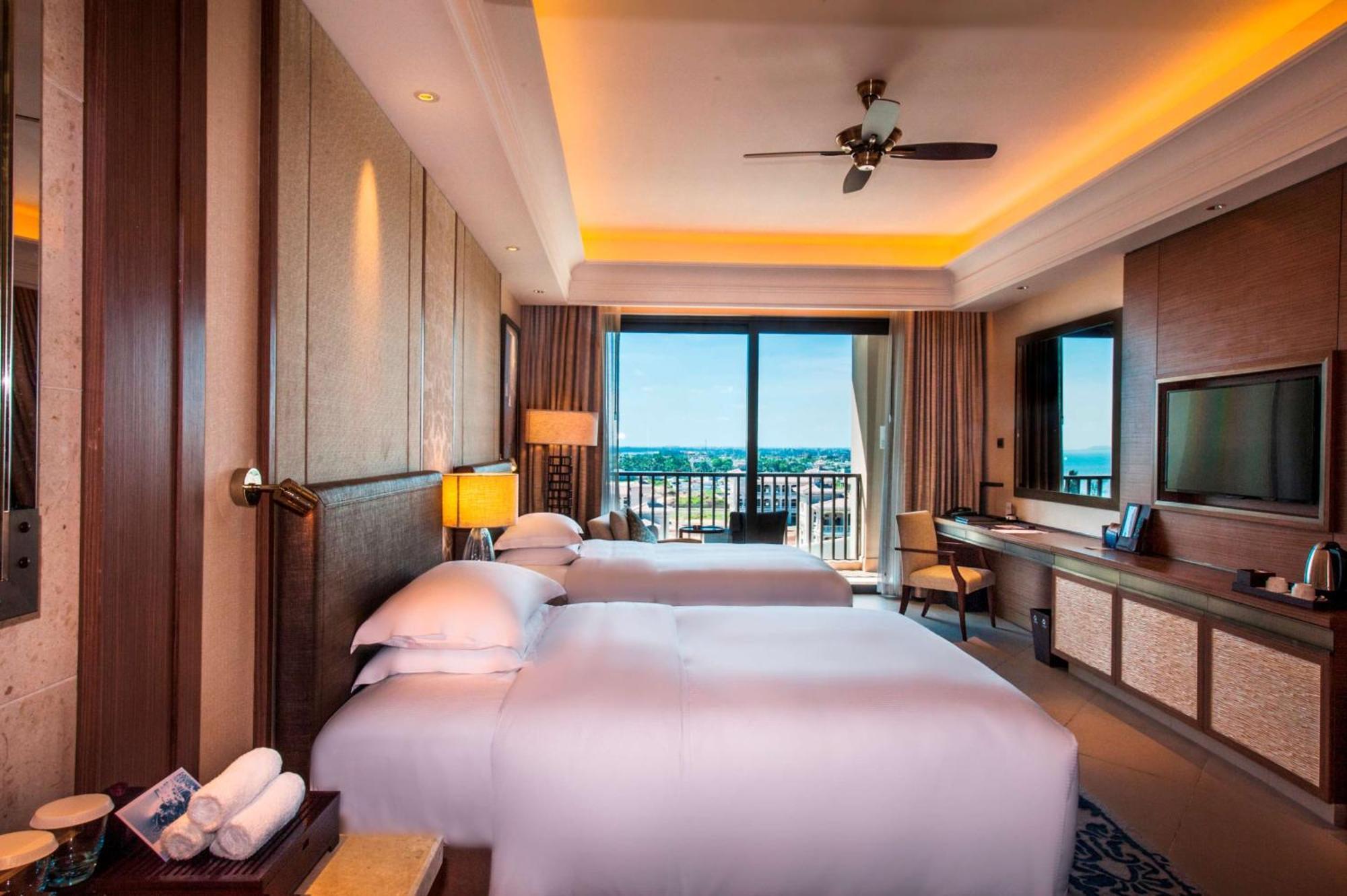 Hilton Haikou Meilan - Beachfront Hotel Exterior foto